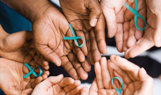 hands holding sexual assault awareness ribbons